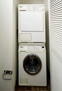 a close up view of a washer and dryer