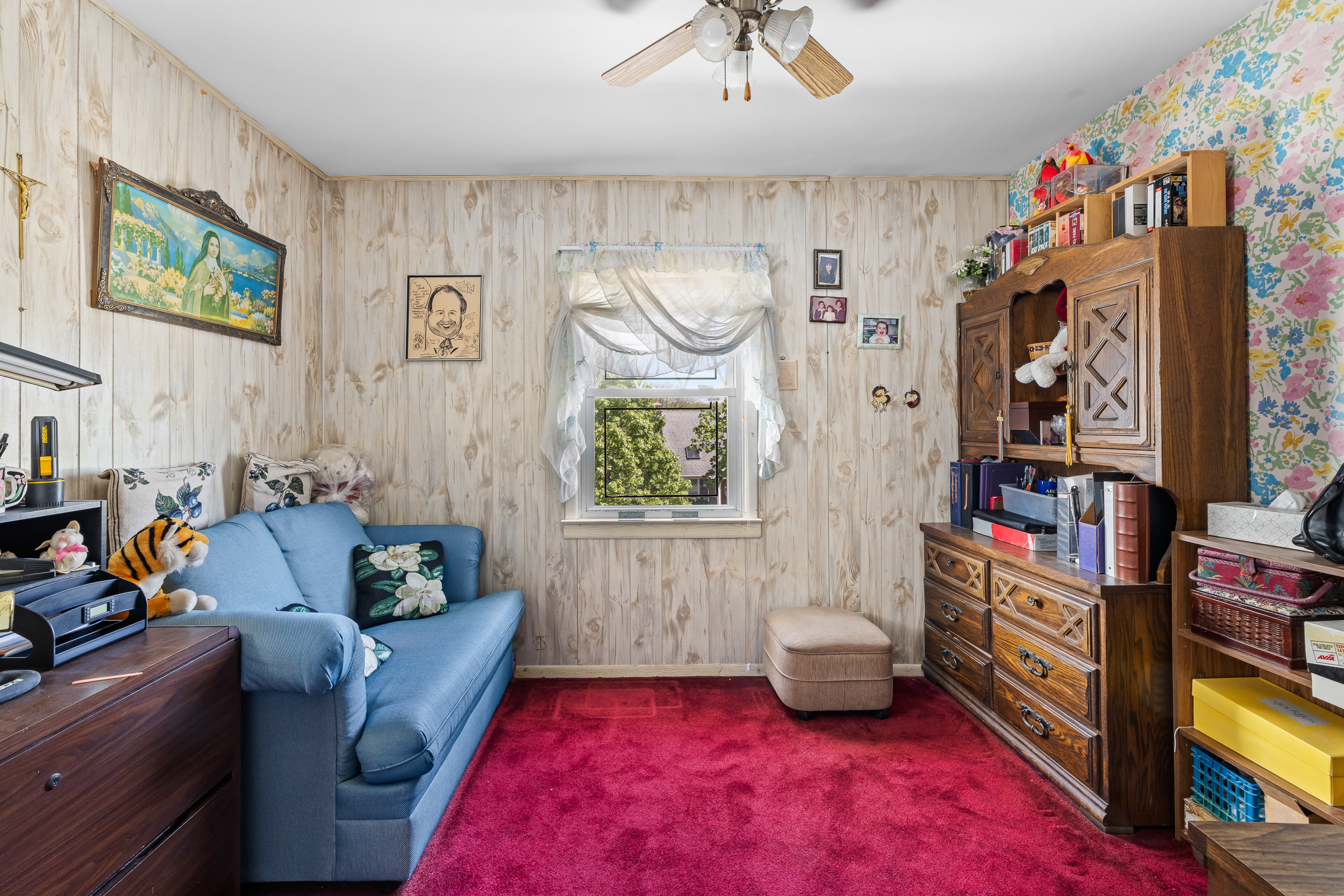 14-28 140th Street Queens, NY 11357 - Photo 9 of 14 a living room with furniture and a window