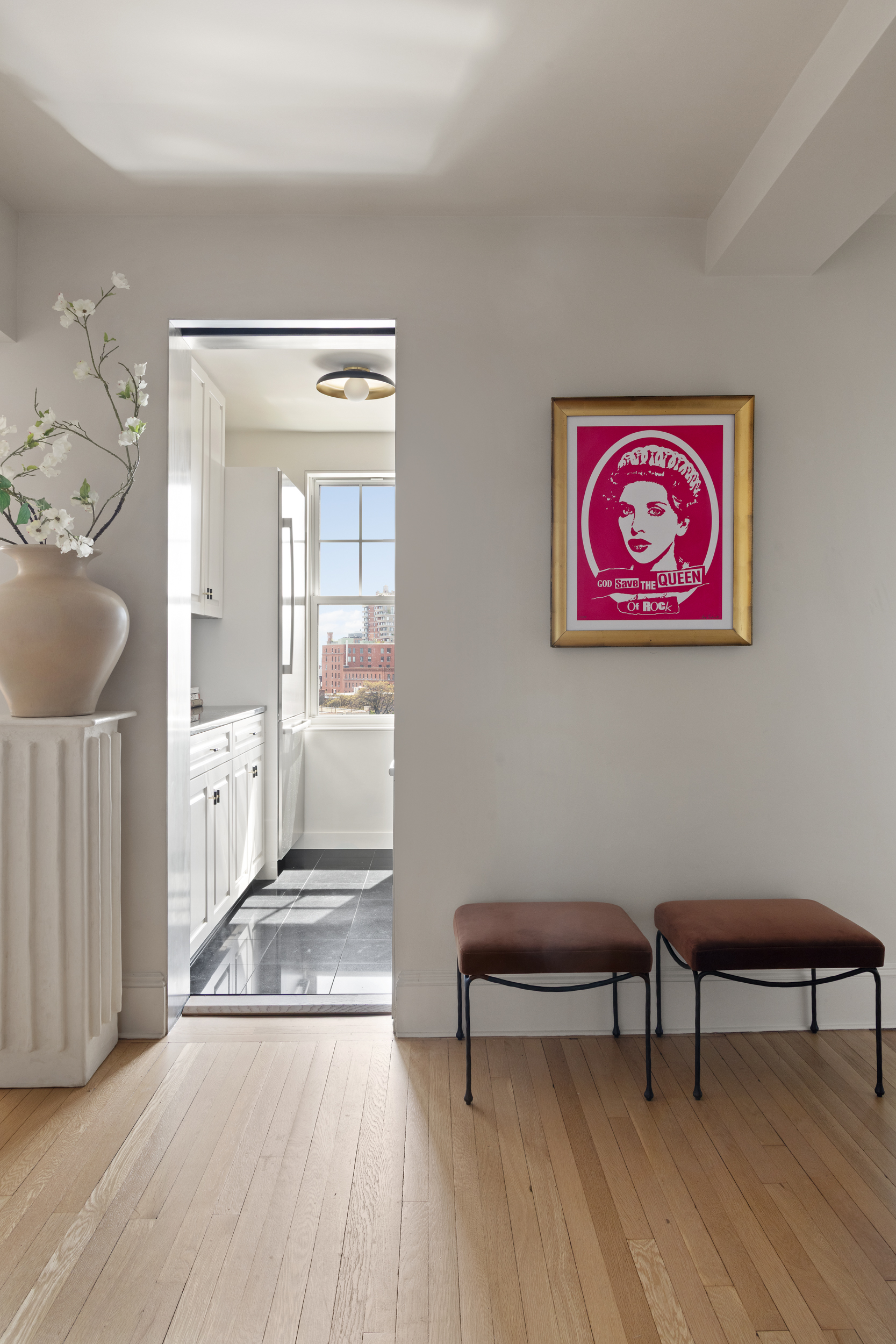 302 West 12th Street, Unit 11F Manhattan, NY 10014 - Photo 7 of 17 a view of a room with furniture and wooden floor