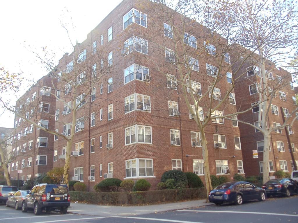 71-36 110th Street, Unit 4C Queens, NY 11375 - Photo 13 of 14 a car parked in front of a building
