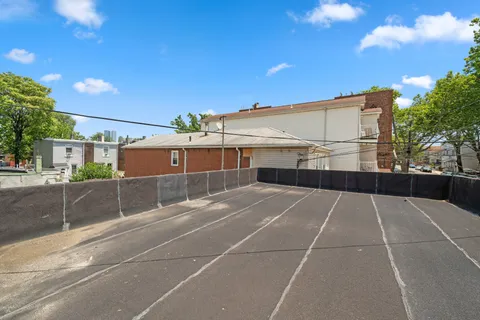 a terrace with a table and chairs