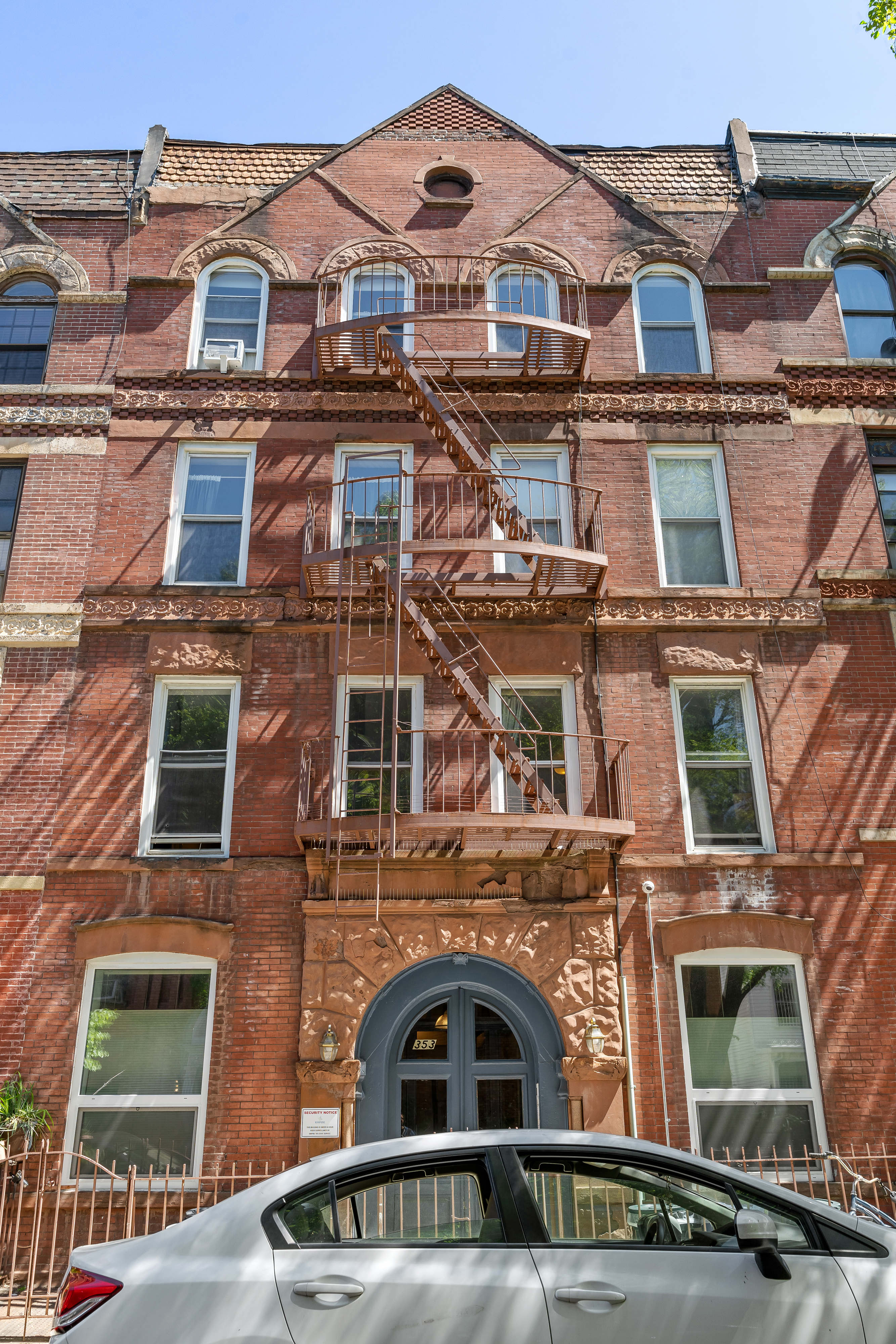 353 12th Street, Unit 2 Brooklyn, NY 11215 - Photo 11 of 17 a front view of a building with a yard