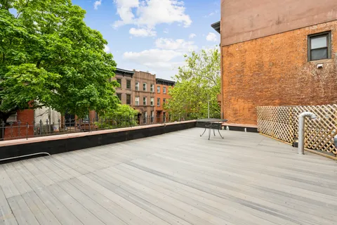 a view of balcony with a couple of water and trees