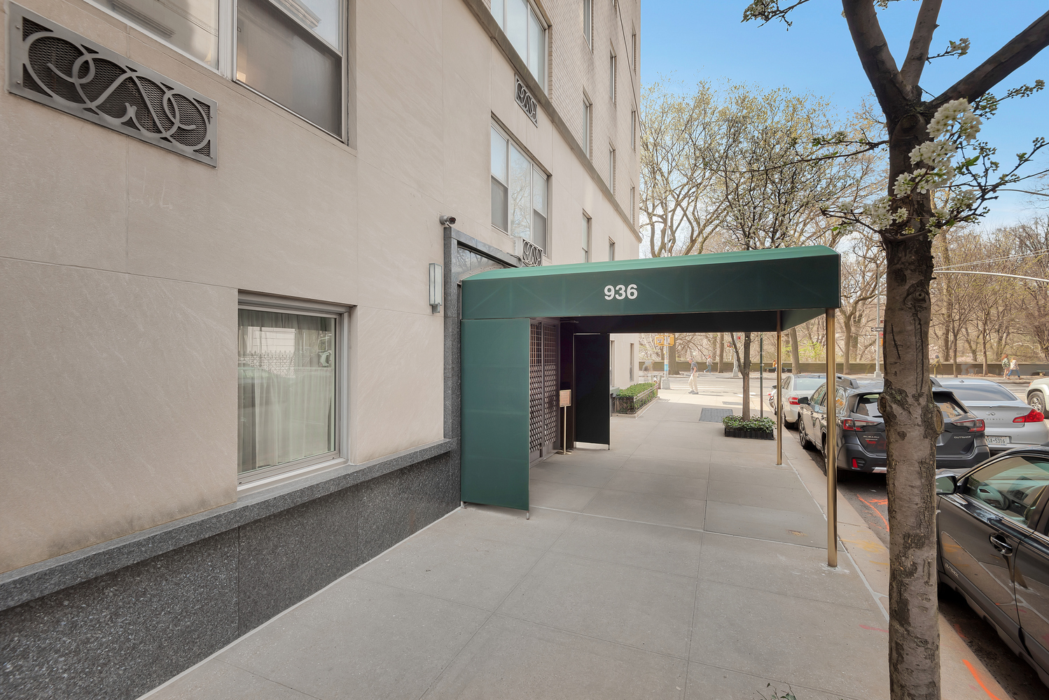 936 5th Avenue, Unit 14B Manhattan, NY 10021 - Photo 11 of 15 a view of a porch with furniture and floor to ceiling window