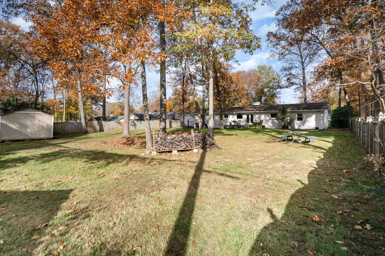 a view of a swimming pool with outdoor seating