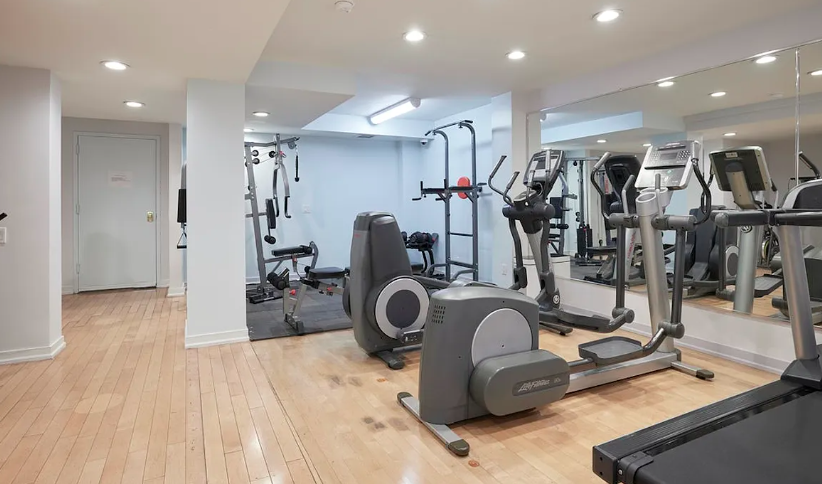 233 East 70th Street, Unit 11P Manhattan, NY 10021 - Photo 13 of 15 a view of a room with gym equipment