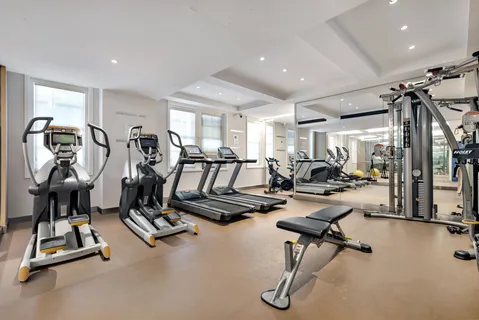 a view of a room with gym equipment
