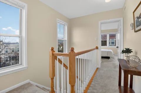a view of a livingroom with furniture and windows