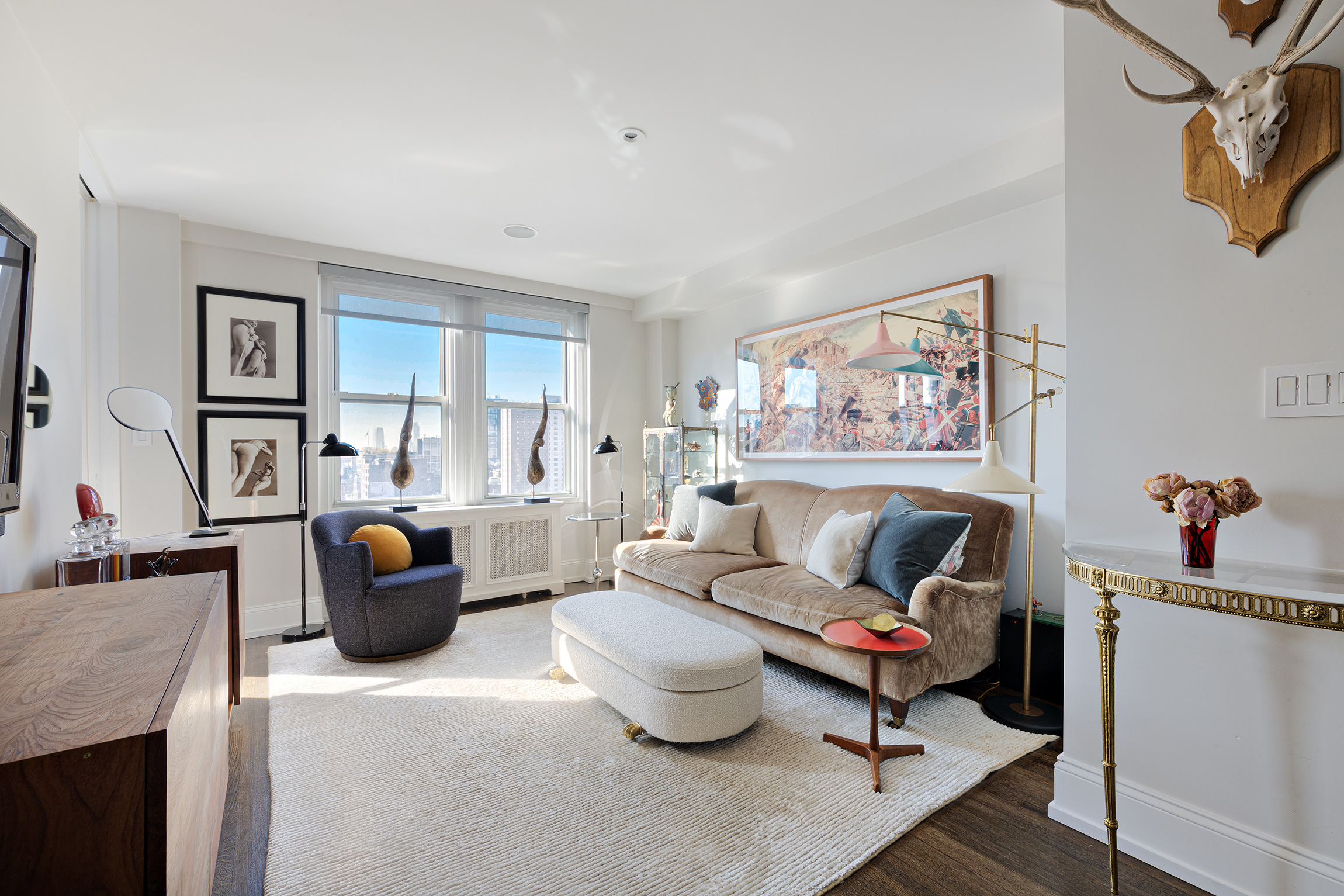 a living room with furniture and a couch