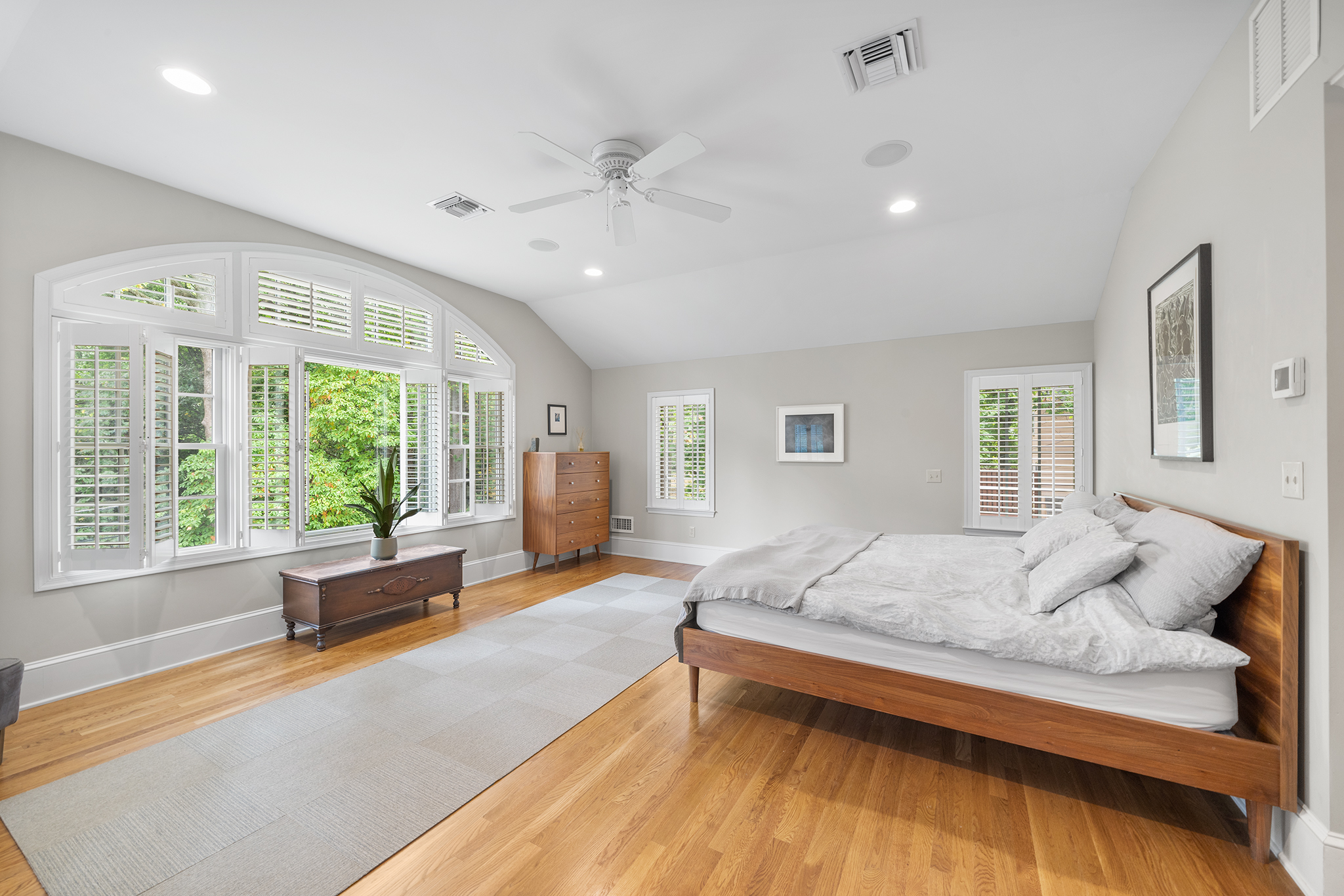 718 Arlington Road Narberth, PA 19072 - Photo 18 of 47 a spacious bedroom with a large bed and a large window