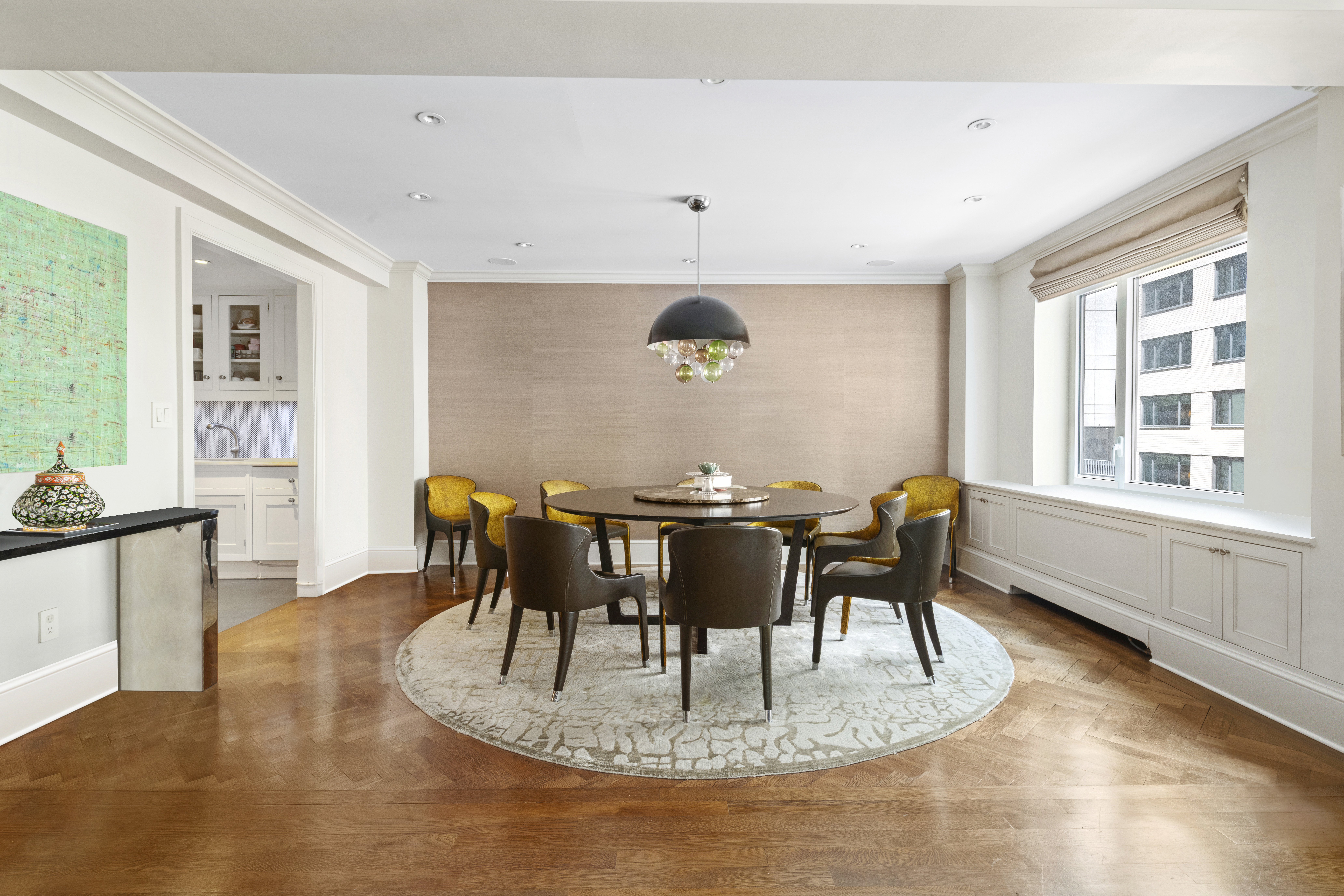530 Park Avenue, Unit 3F Manhattan, NY 10065 - Photo 3 of 25 a view of a dining room with furniture window and outside view