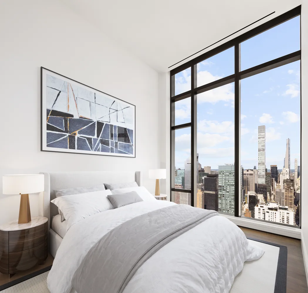 a bathroom with a bathtub and next to a window