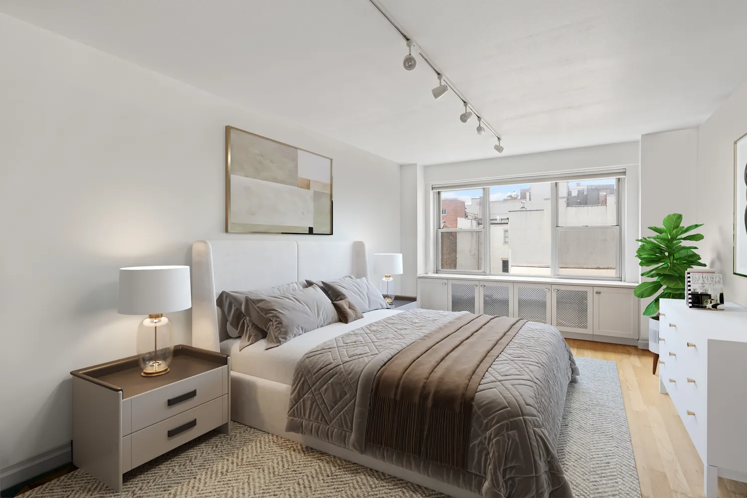 a bedroom with a bed and a large window