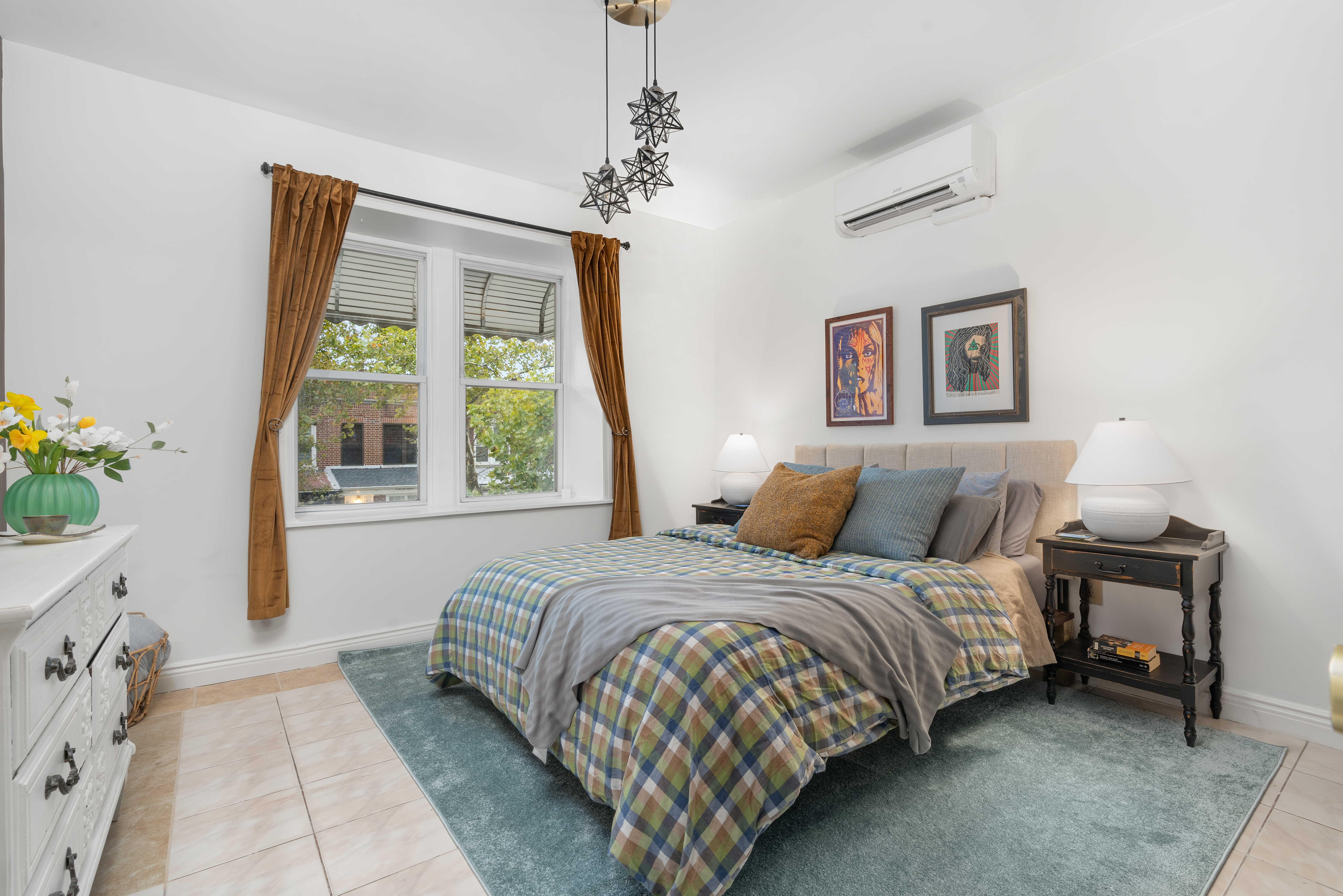 138 East 29th Street Brooklyn, NY 11226 - Photo 6 of 12 a bedroom with a bed and a window