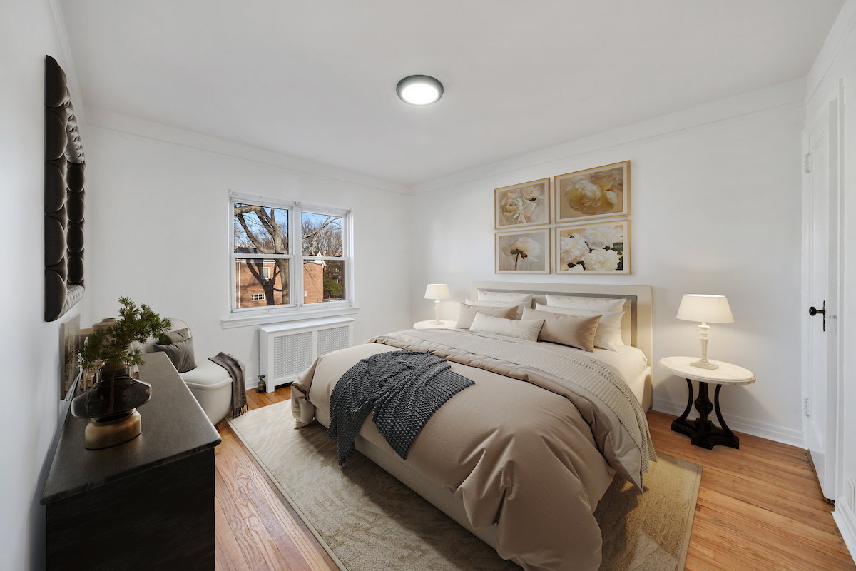 82-56 Eliot Avenue Queens, NY 11379 - Photo 4 of 7 a bedroom with a bed and a couch