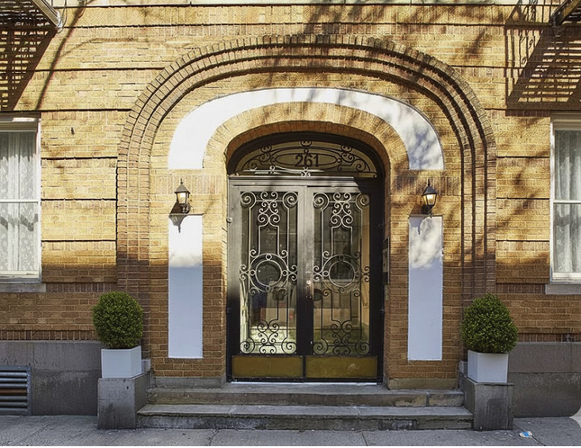 261 West 22nd Street, Unit 23 Manhattan, NY 10011 - Photo 6 of 14 a view of entrance gate of a house