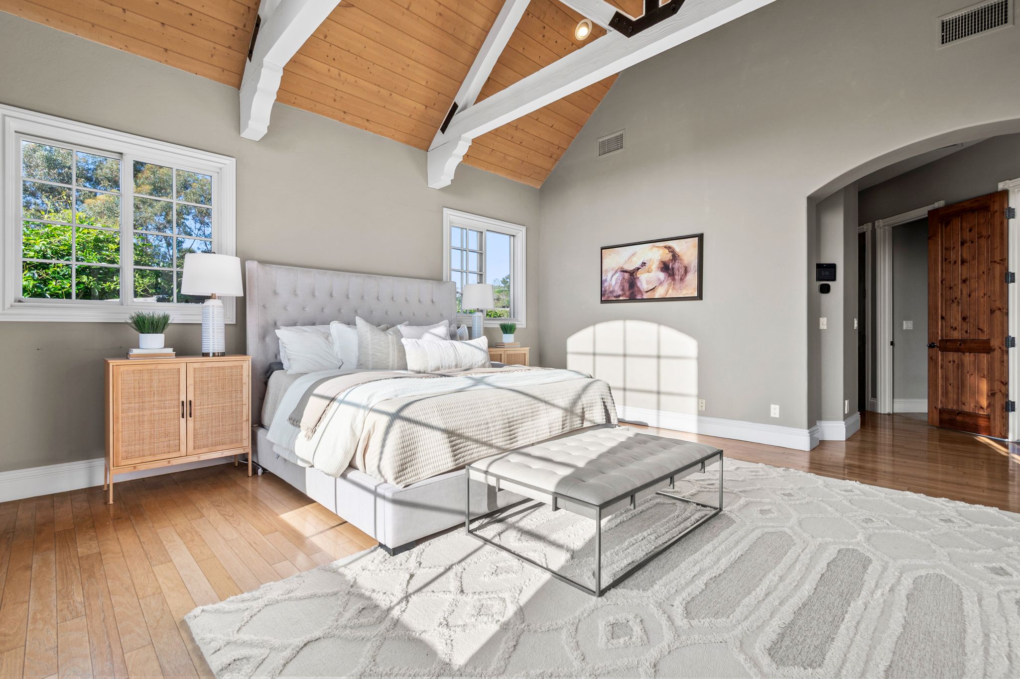 Dove Hollow Road Encinitas, CA 92024 - Photo 7 of 16 a spacious bedroom with a bed and a large window