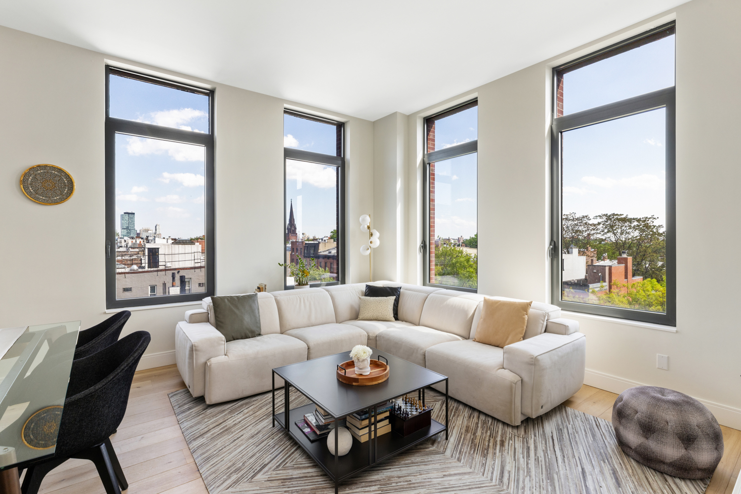 347 Henry Street, Unit 5B Brooklyn, NY 11201 - Photo 2 of 25 a living room with furniture and a large window