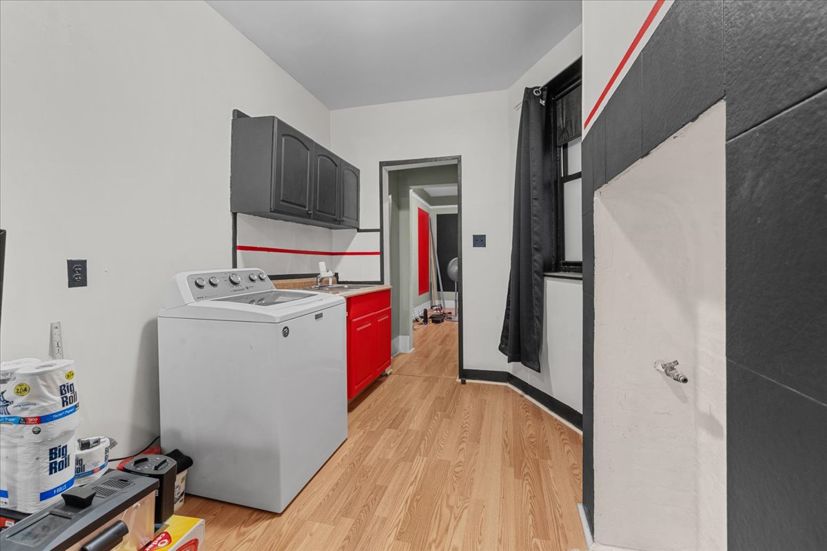 326 West 17th Street, Unit 3E Manhattan, NY 10011 - Photo 6 of 8 a room with storage and utility