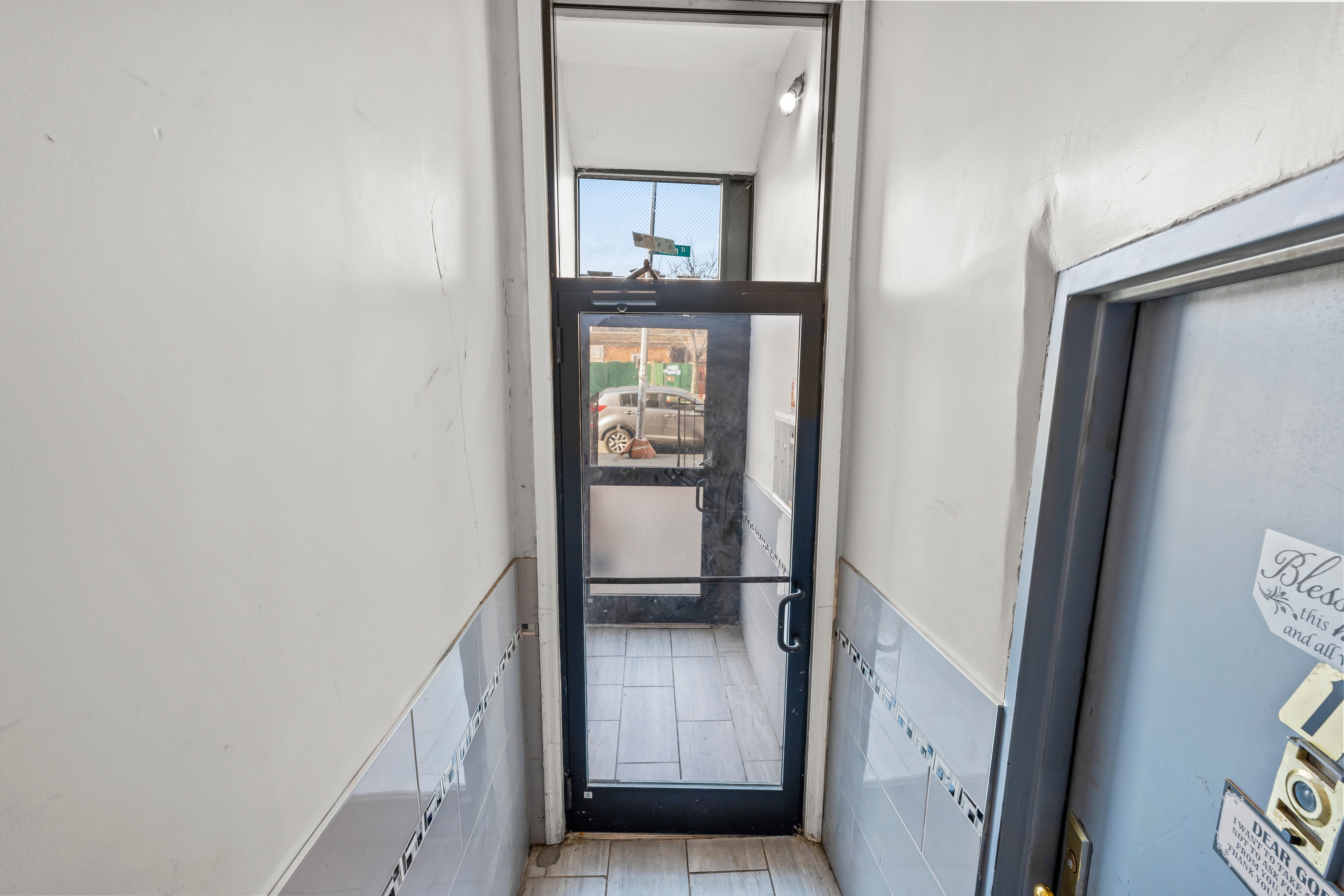 2186 Fulton Street Brooklyn, NY 11233 - Photo 6 of 9 a view of front door
