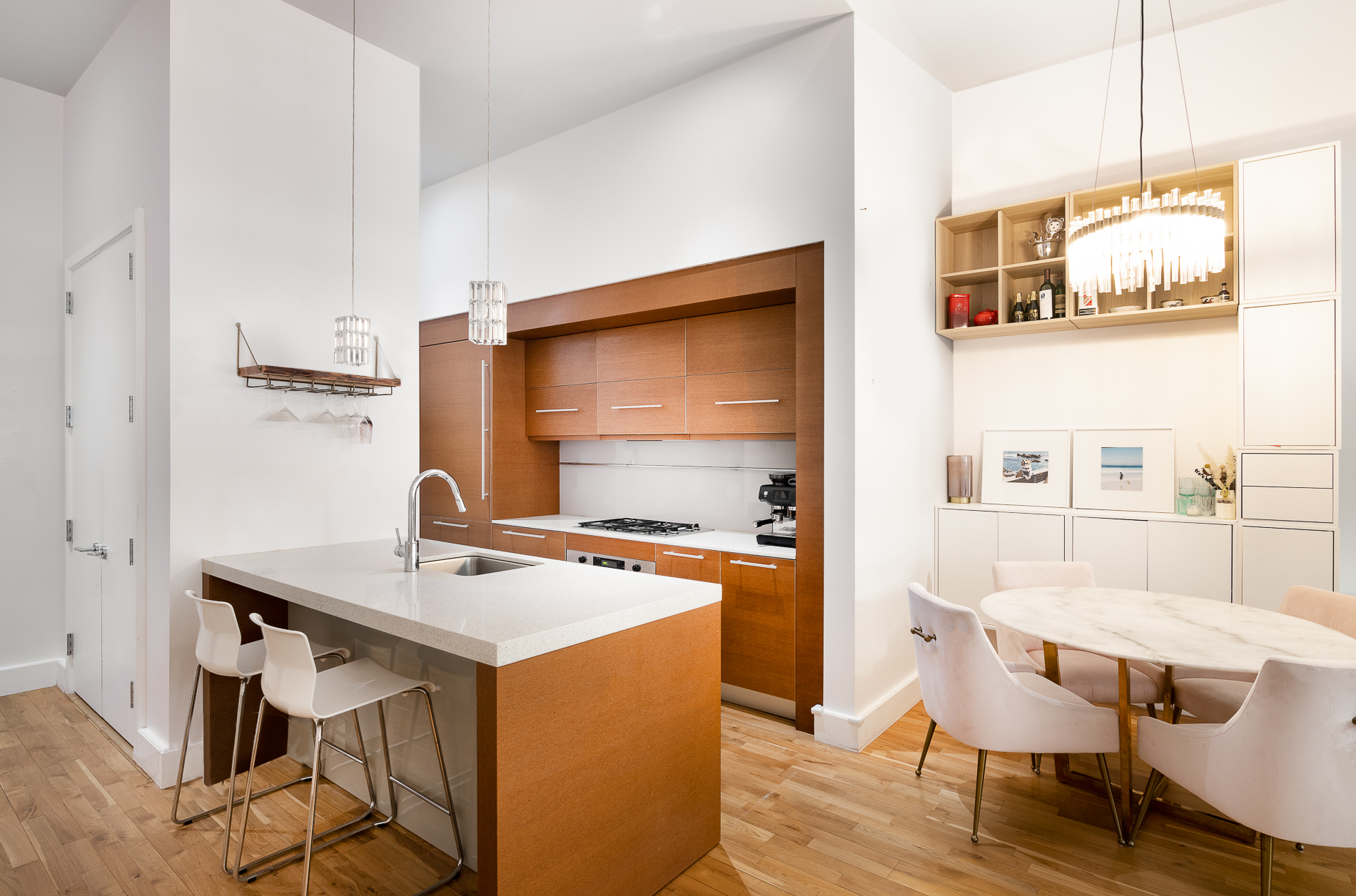 360 Furman Street, Unit 701 Brooklyn, NY 11201 - Photo 4 of 14 a room with a table chairs and wooden floor