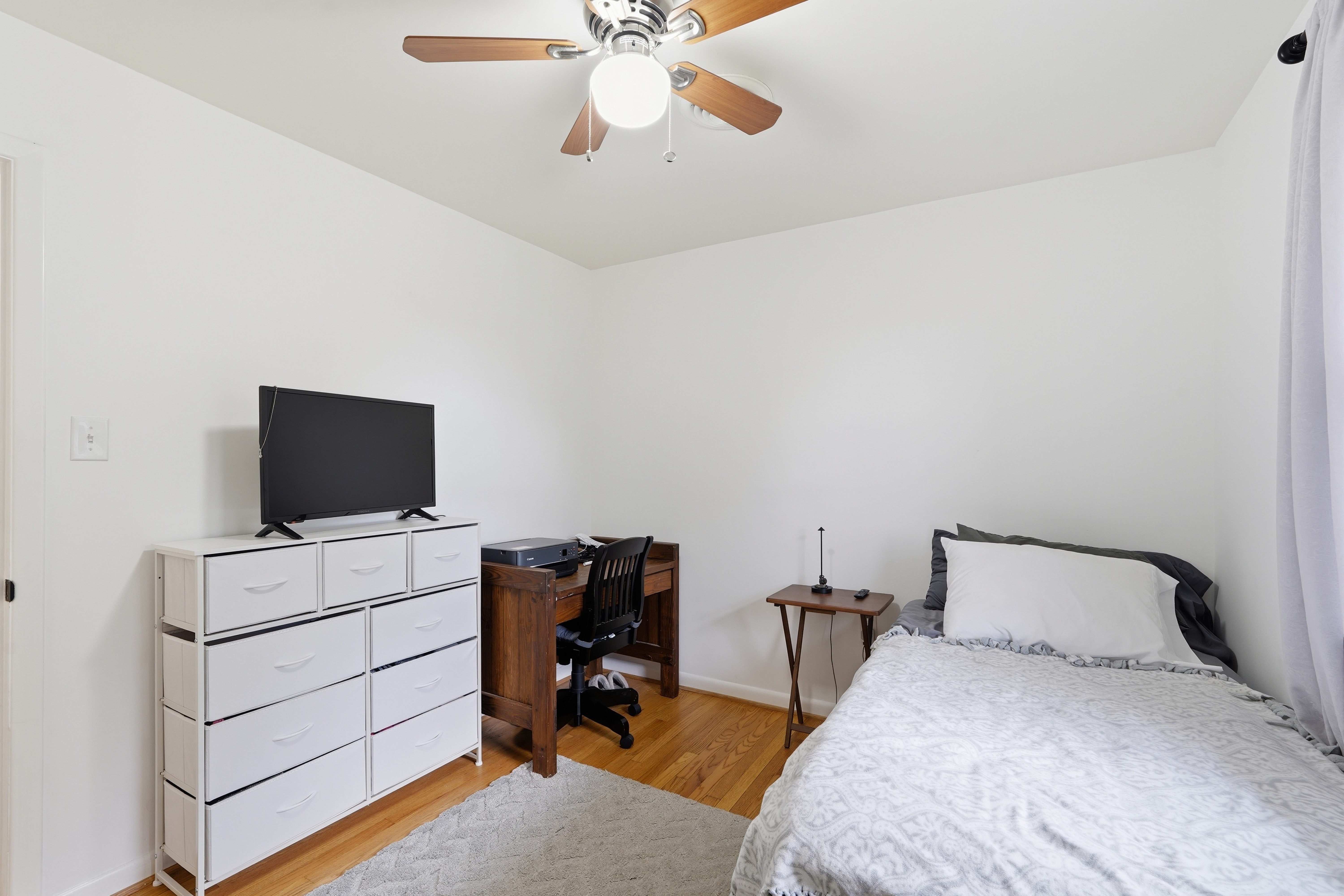 7717 McKaig Road Frederick, MD 21701 - Photo 35 of 53 a bedroom with a bed and a flat screen tv