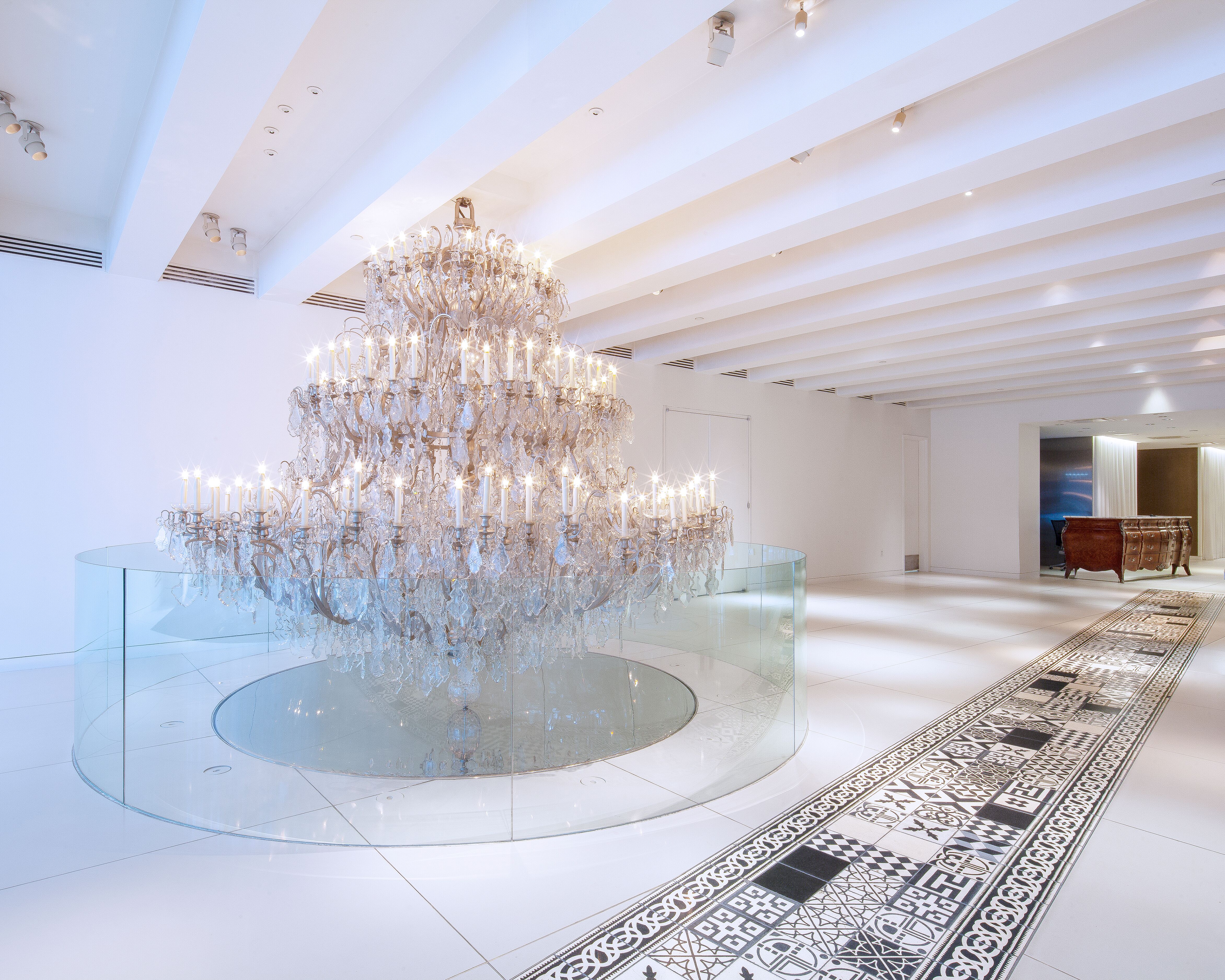 15 Broad Street, Unit 3100 Manhattan, NY 10005 - Photo 11 of 27 a view of a chandelier in big room