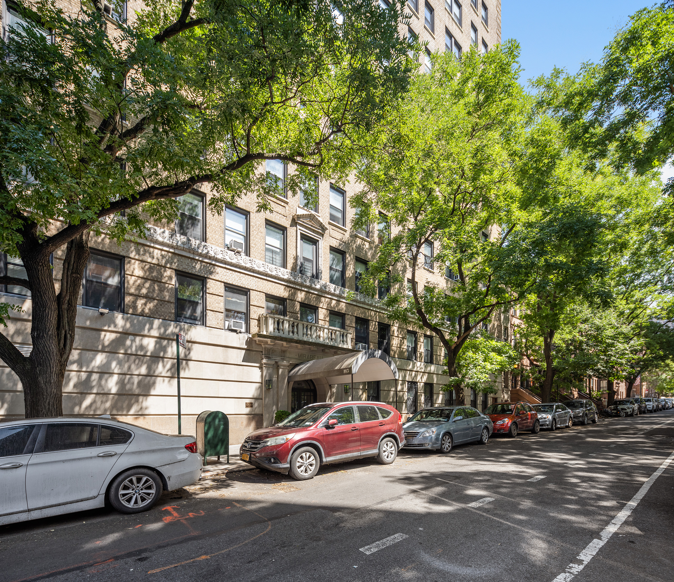 165 West 91st Street, Unit 9AB Manhattan, NY 10024 - Photo 19 of 24 a car parked in front of a building