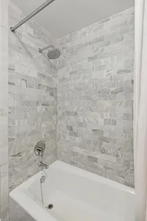 a bathroom with a bathtub