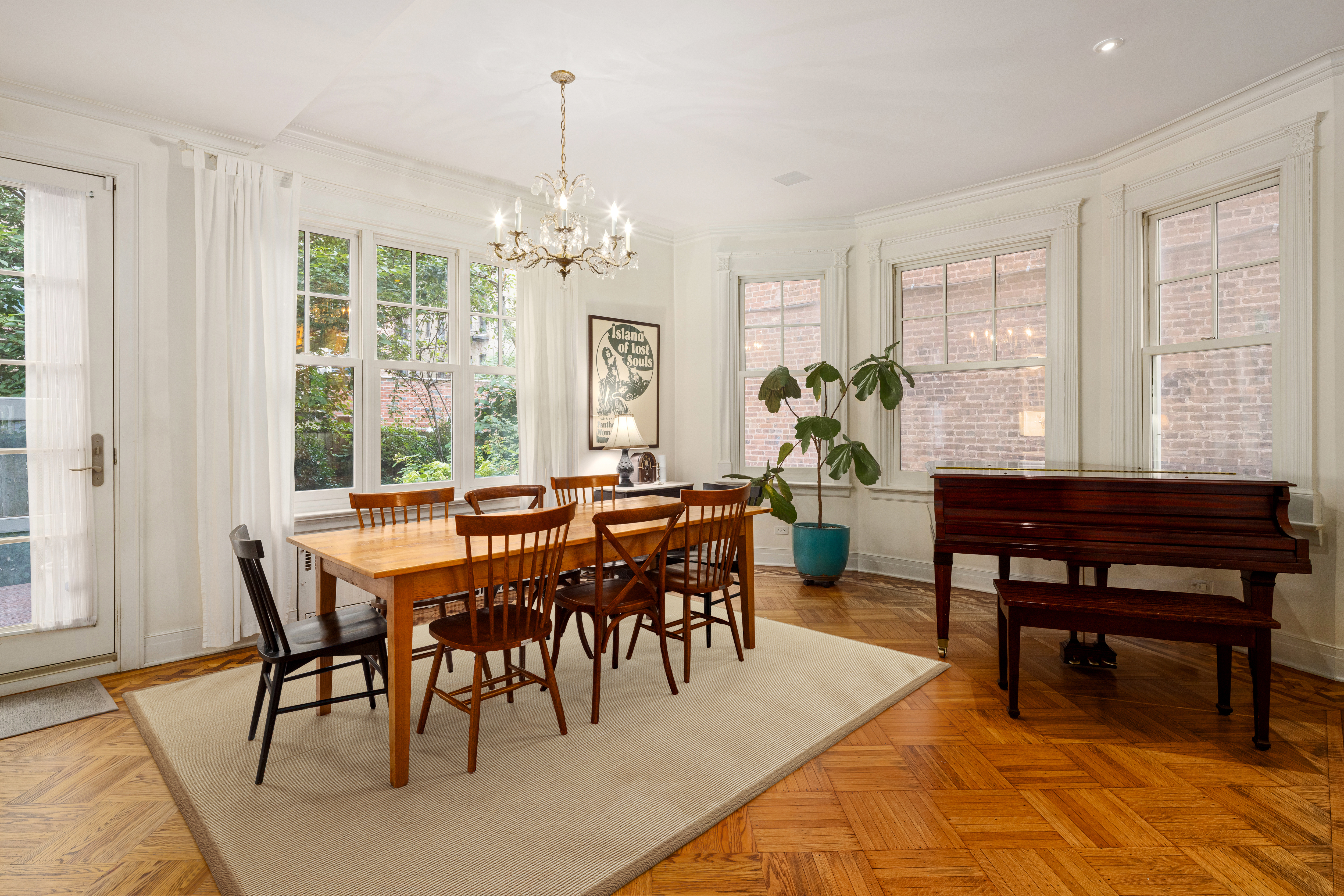 200 Fenimore Street Brooklyn, NY 11225 - Photo 9 of 24 a view of a dining room with furniture window and wooden floor