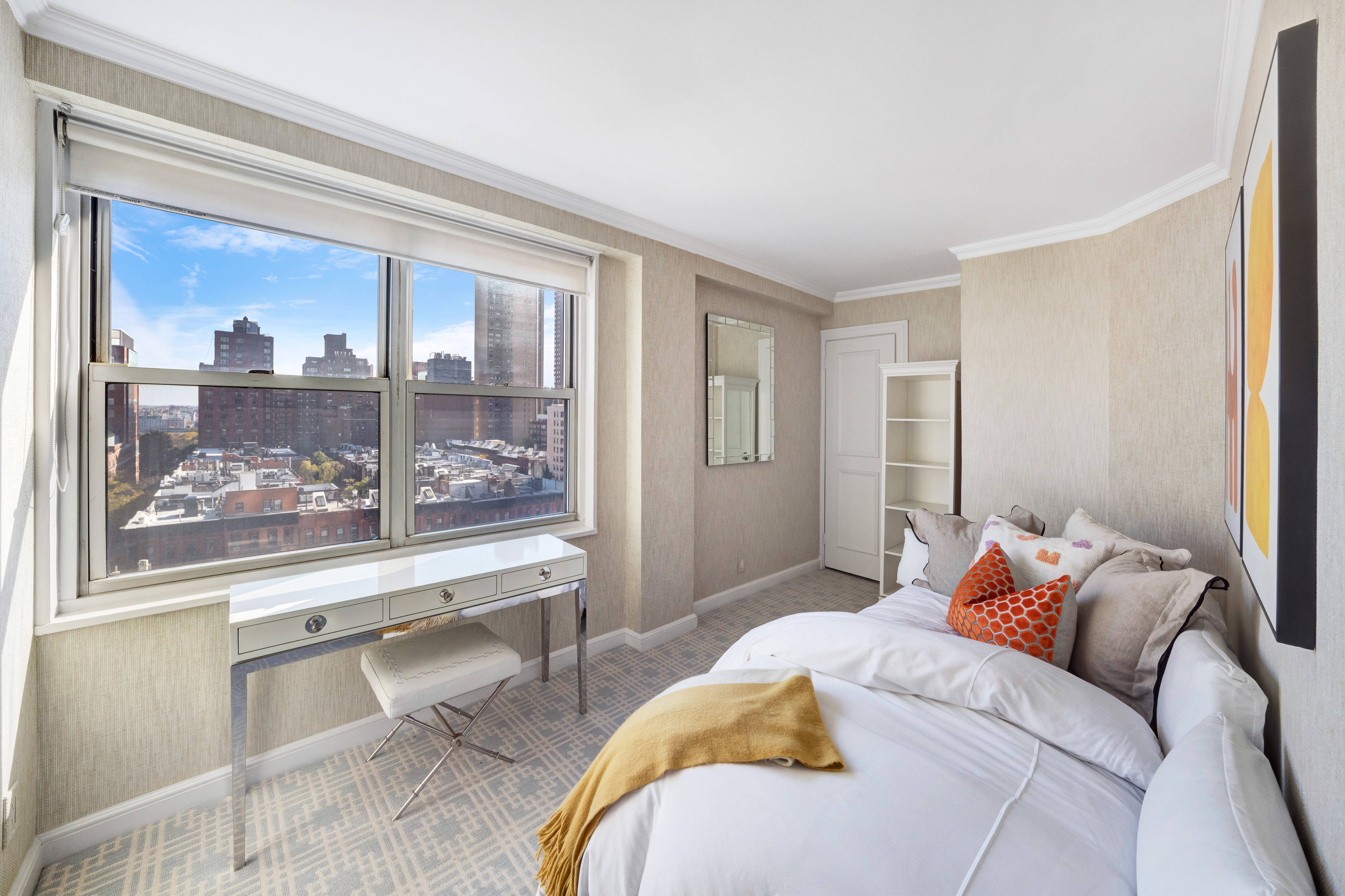 444 East 84th Street, Unit PHE Manhattan, NY 10028 - Photo 8 of 12 a living room with furniture and a window
