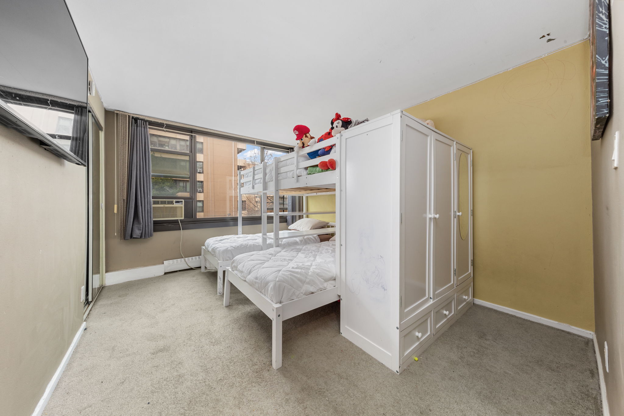 11-01 162nd Street, Unit 3D Queens, NY 11357 - Photo 7 of 16 a view of livingroom with furniture and window