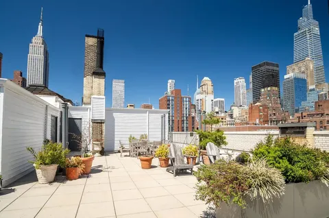 a view of a city with tall buildings