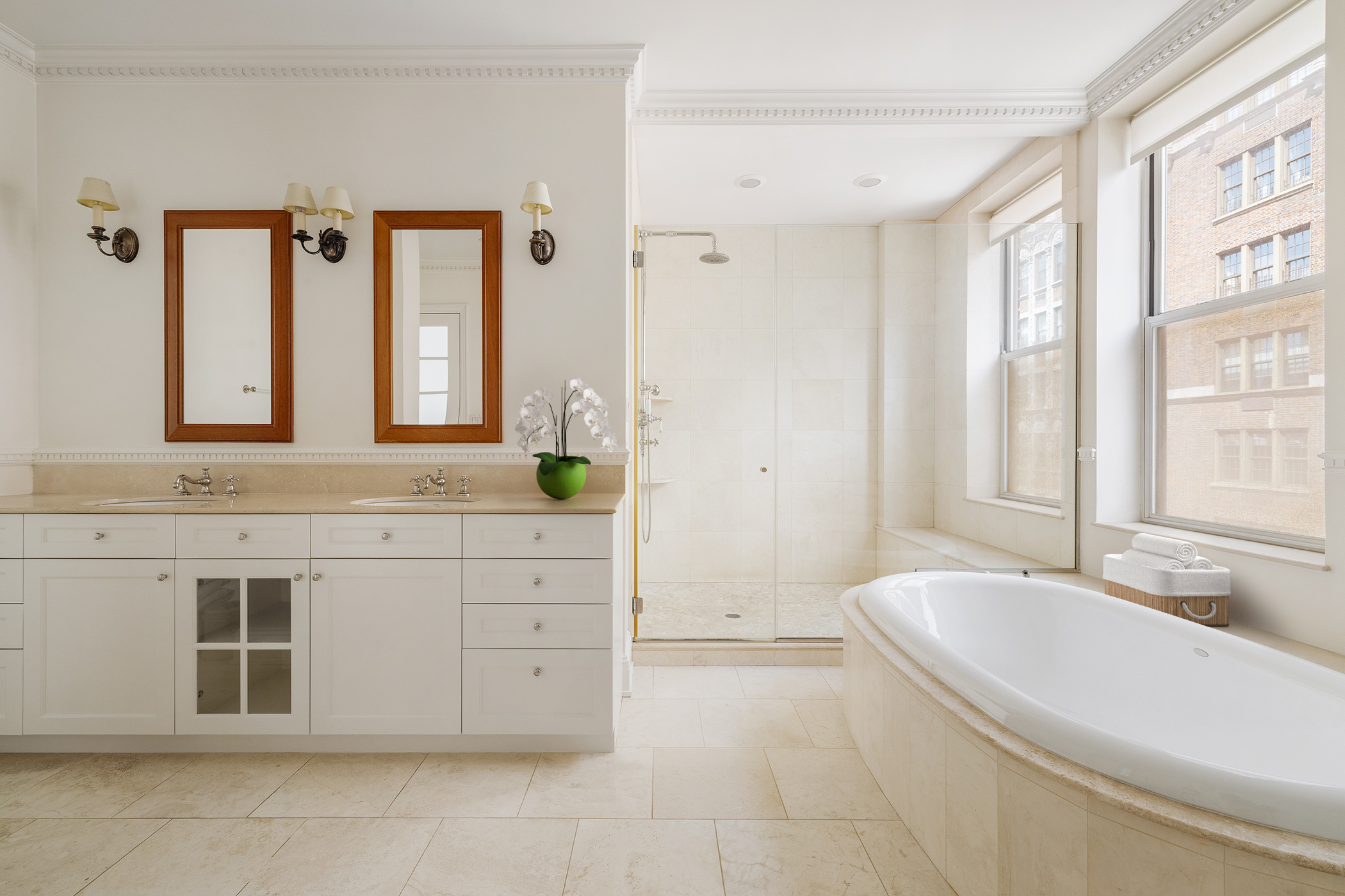 876 Park Avenue, Unit 9N Manhattan, NY 10075 - Photo 9 of 18 a bathroom with a granite countertop sink and a mirror