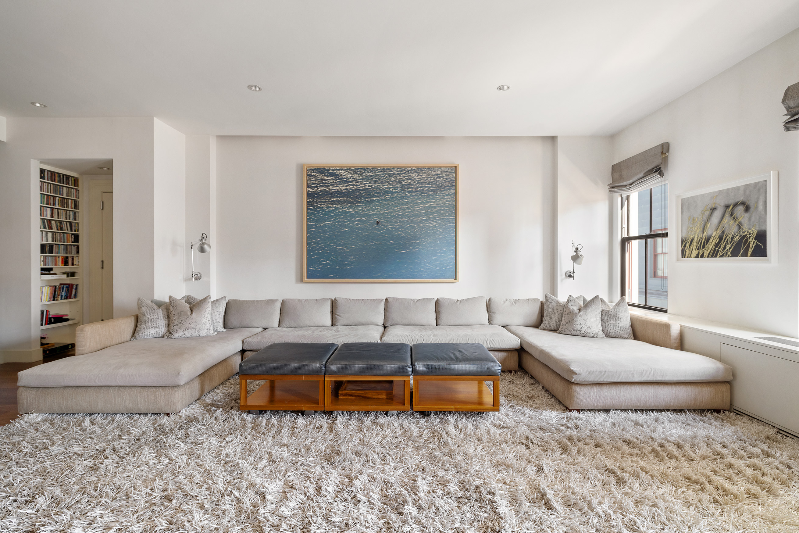 27 North Moore Street, Unit 10D Manhattan, NY 10013 - Photo 8 of 30 a living room with furniture and a couch