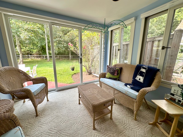 11 Juniper Circle Brewster, MA 02631 - Photo 12 of 29 a living room with furniture and a large window
