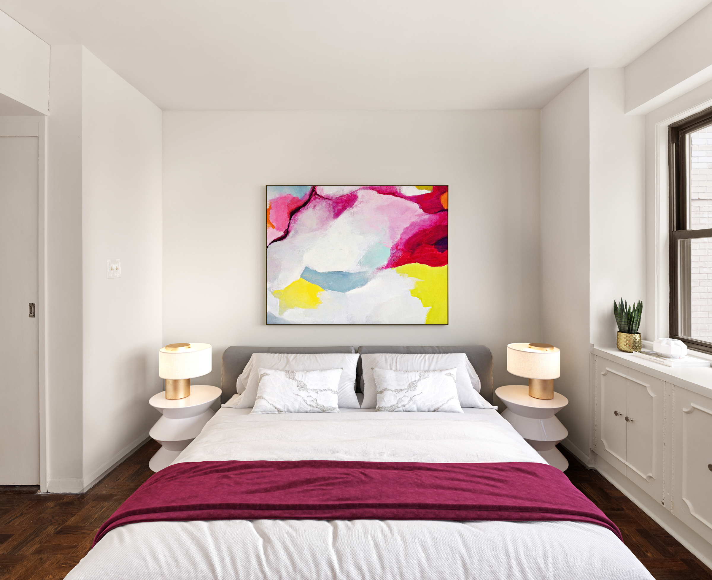 411 East 57th Street, Unit 7C Manhattan, NY 10022 - Photo 3 of 9 a bedroom with a bed and painting on the wall