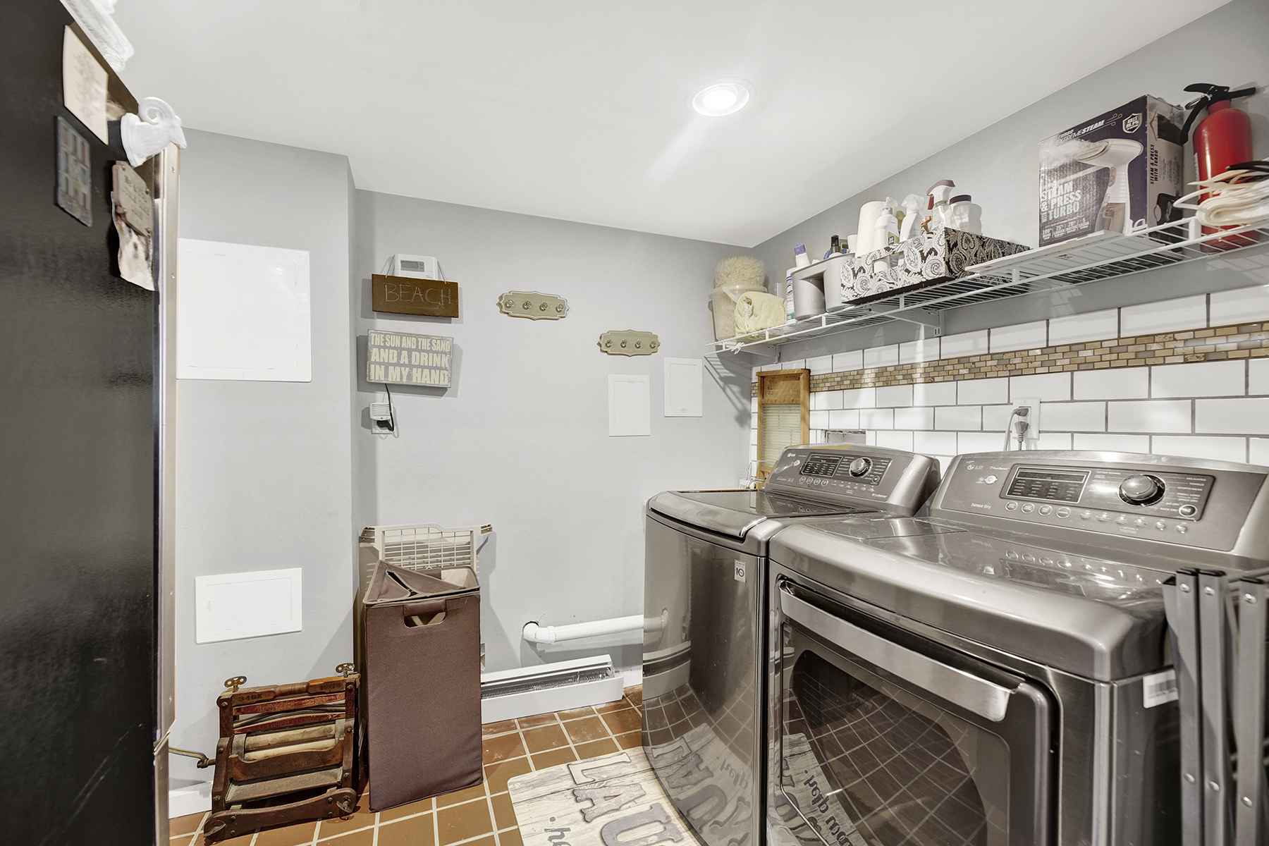 4-53 Beach 142nd Street Queens, NY 11694 - Photo 31 of 39 a utility room with washer and dryer