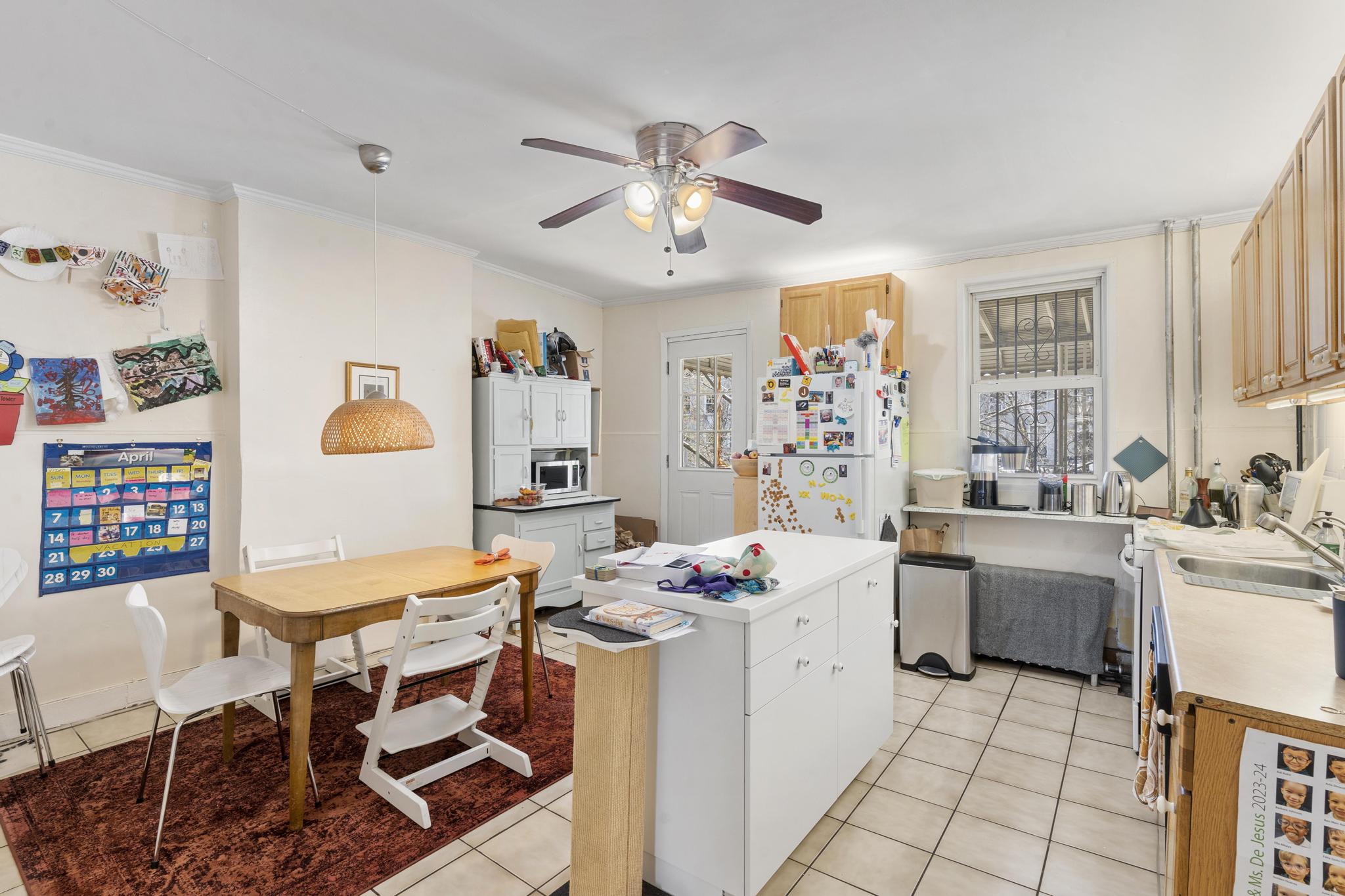 364 Clermont Avenue Brooklyn, NY 11238 - Photo 11 of 18 a view of a dining room with furniture window and wooden floor