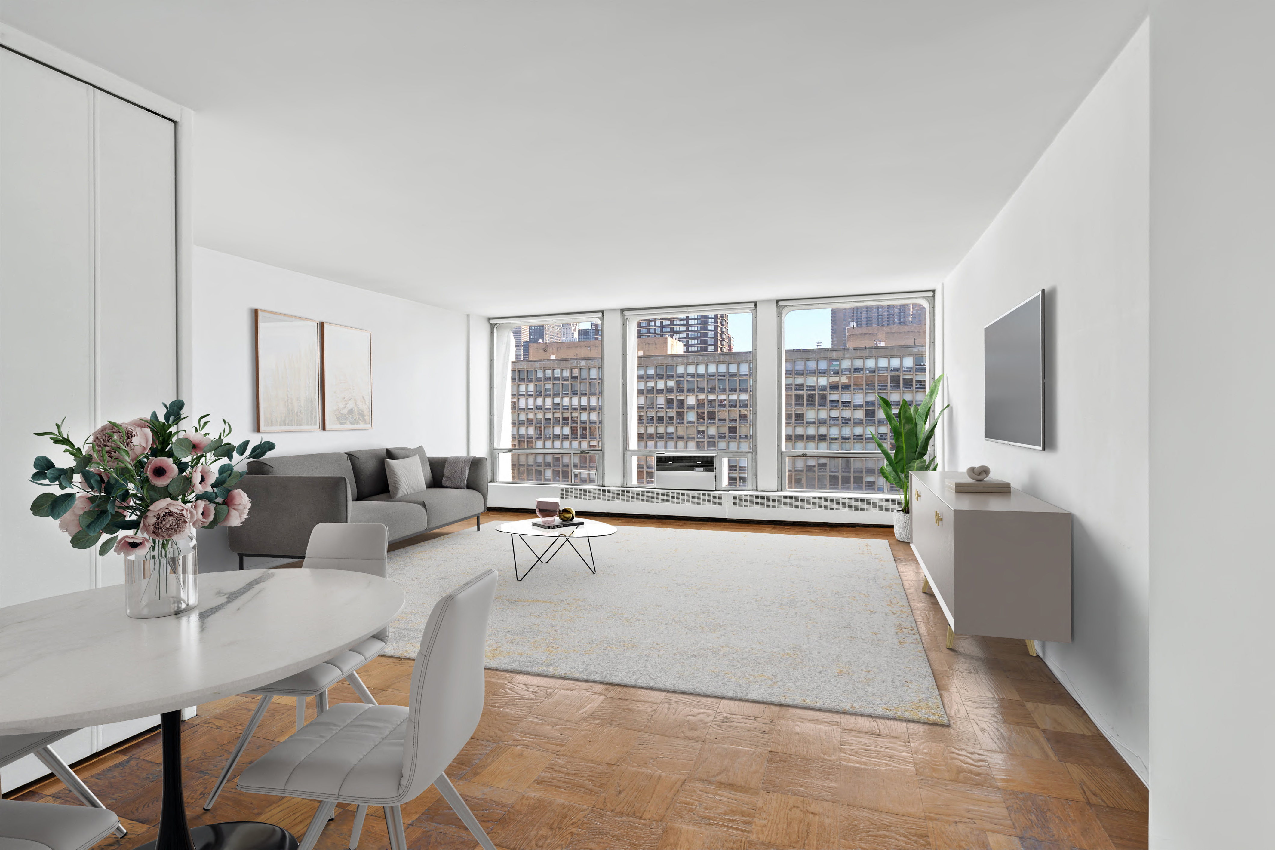 333 East 30th Street, Unit 18N Manhattan, NY 10016 - Photo 1 of 18 a living room with furniture and a large window