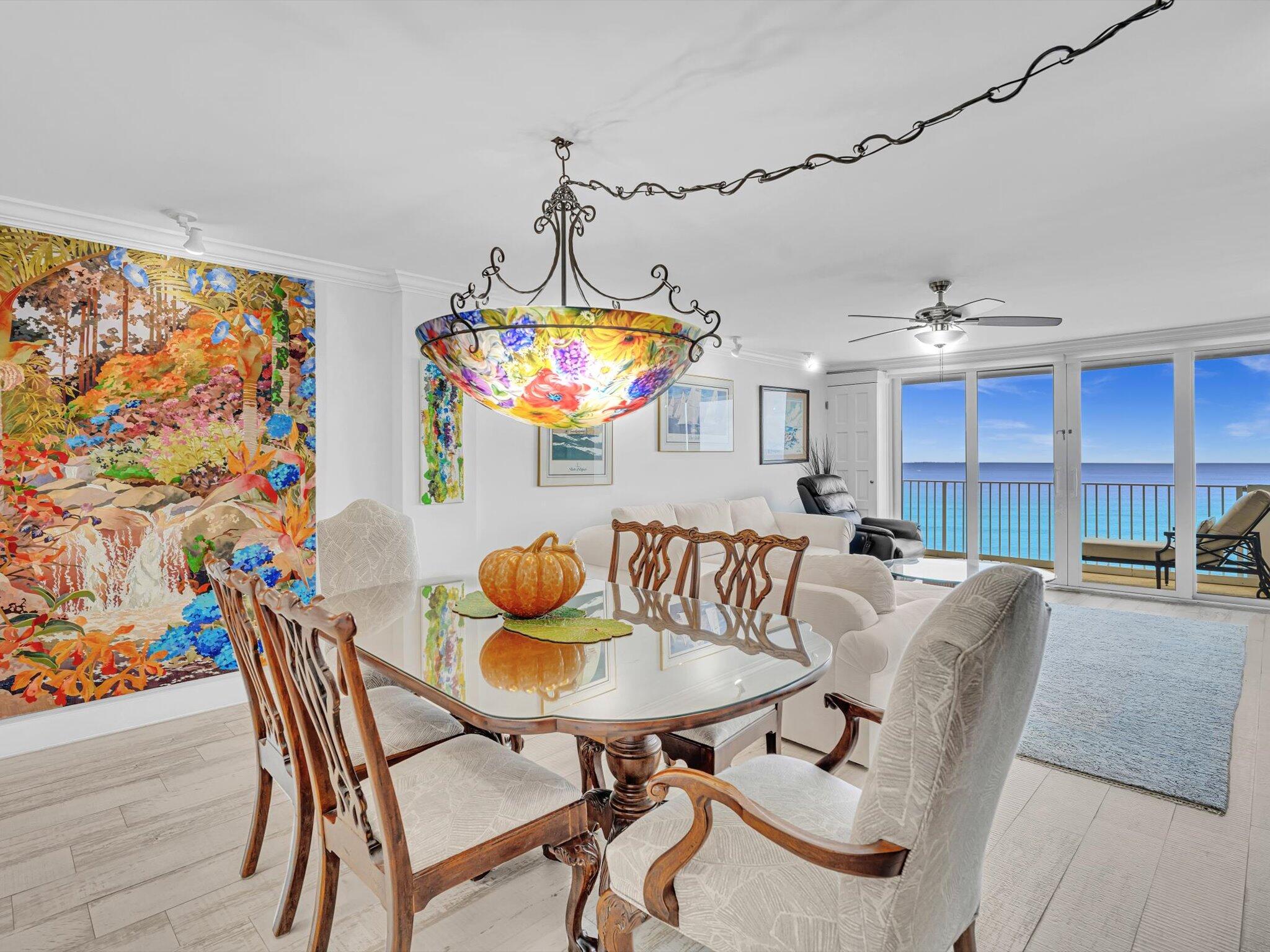 3000 South Ocean Boulevard, Unit 1504 Boca Raton, FL 33432 - Photo 8 of 64 a view of a dining room with furniture and chandelier