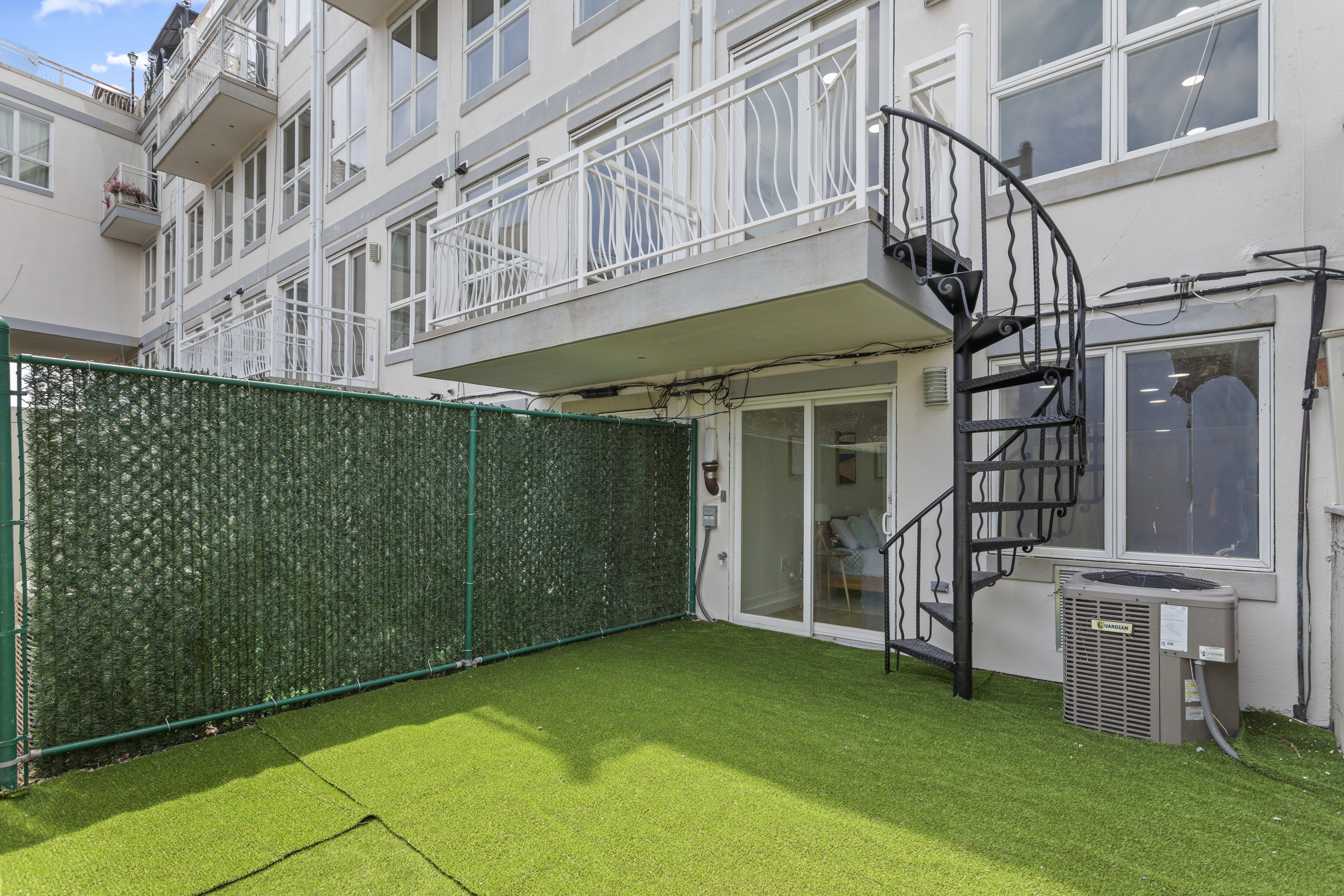 3112 Emmons Avenue, Unit 3140A-2 Brooklyn, NY 11235 - Photo 9 of 13 front view of a house with a yard