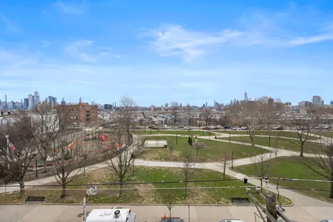 a view of a lake with a city