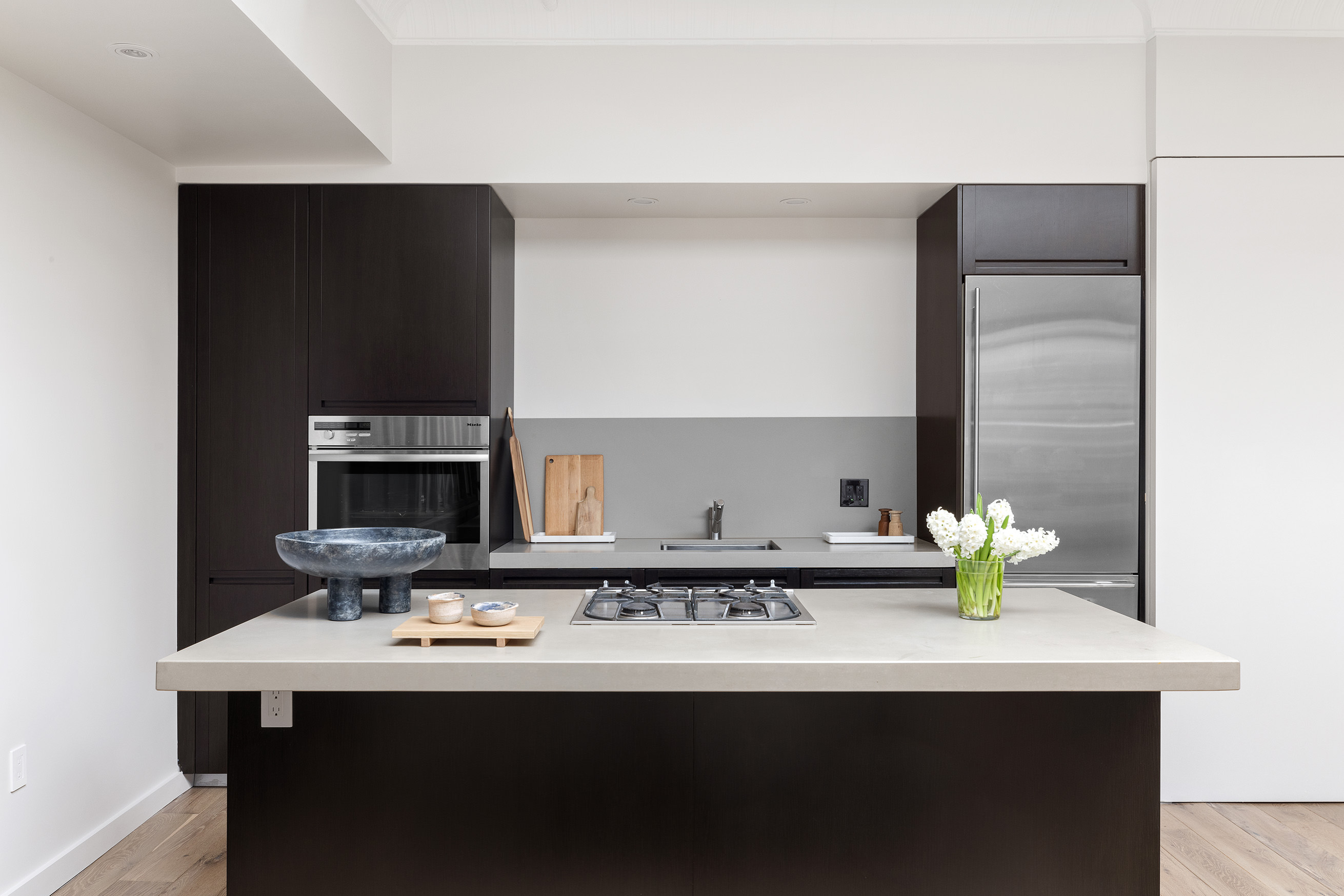 22 East 18th Street, Unit PH6B Manhattan, NY 10003 - Photo 5 of 13 a bathroom with a sink and a mirror