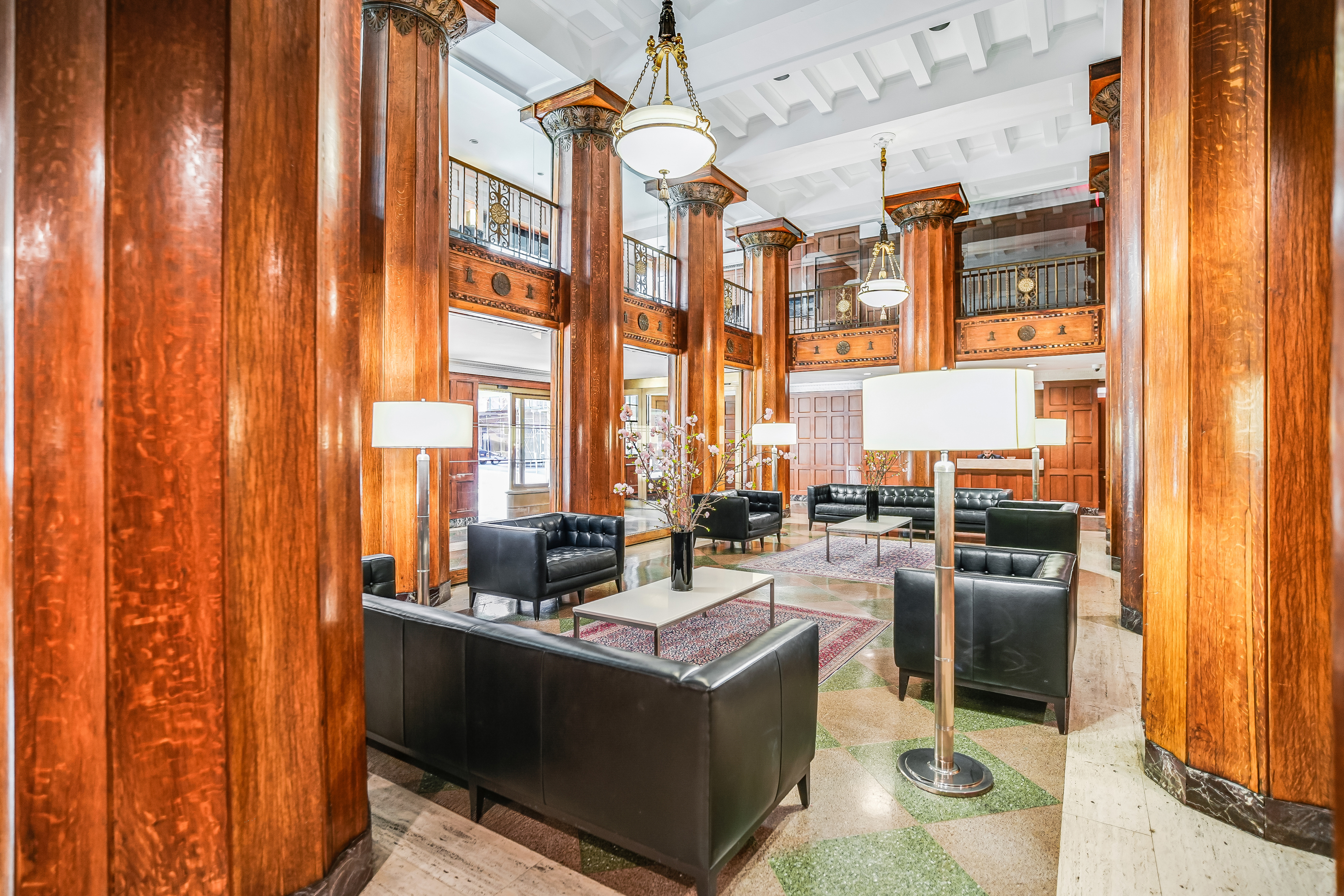1 5th Avenue, Unit 5GH Manhattan, NY 10003 - Photo 23 of 26 a view of living room with kitchen island granite countertop furniture and a large window