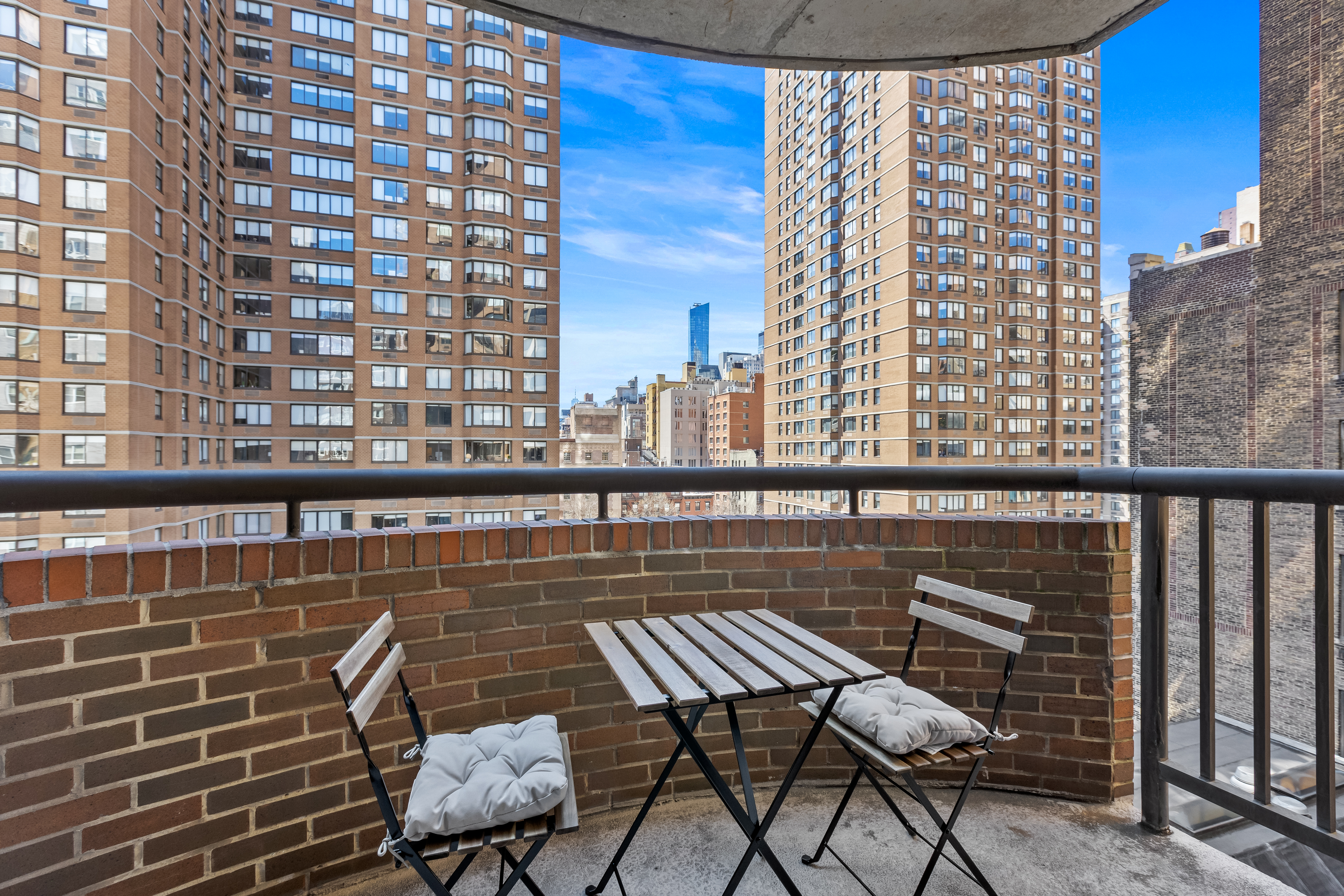 157 East 32nd Street, Unit 8A Manhattan, NY 10016 - Photo 11 of 16 a view of a balcony with chairs