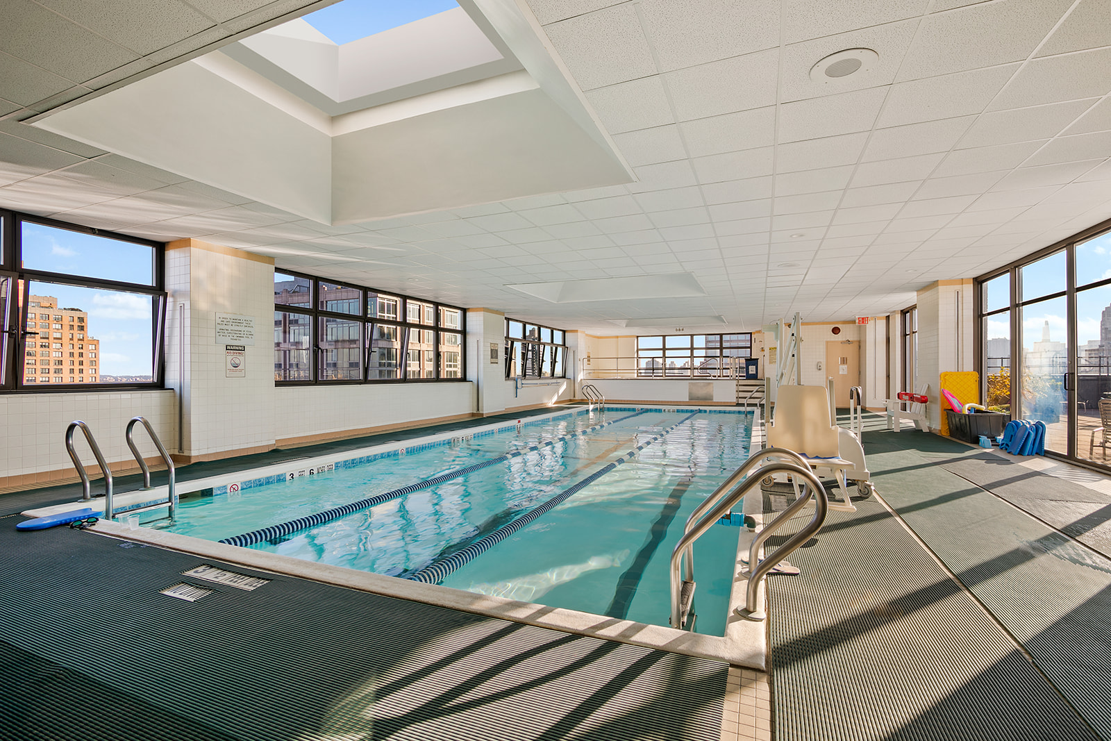 340 East 93rd Street, Unit 27K Manhattan, NY 10128 - Photo 7 of 12 a view of a swimming pool and window