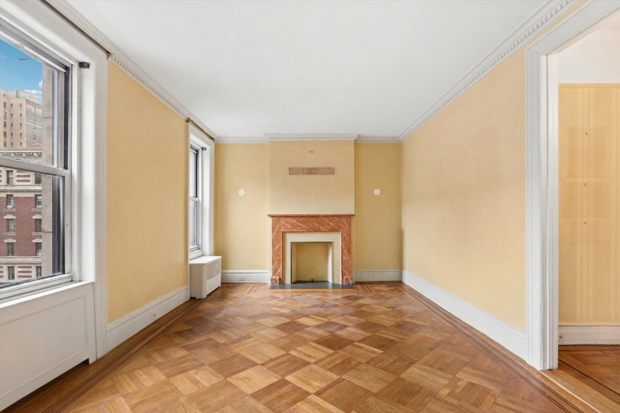17 East 97th Street, Unit 5A Manhattan, NY 10029 - Photo 4 of 25 a view of an empty room with a window