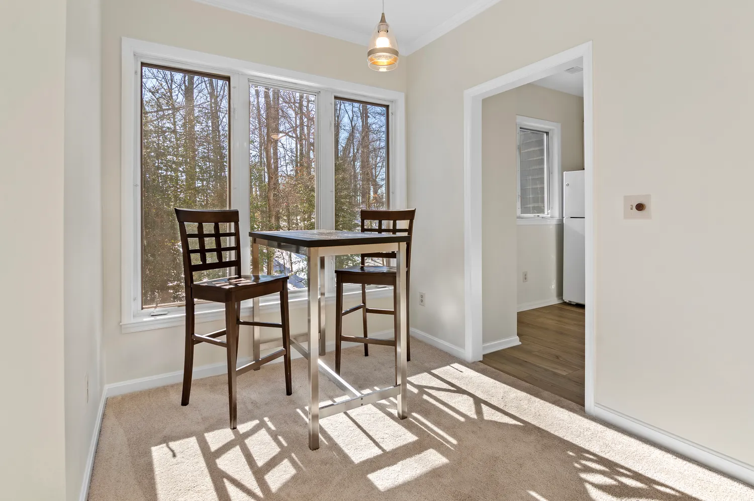 a view of a livingroom with furniture and window