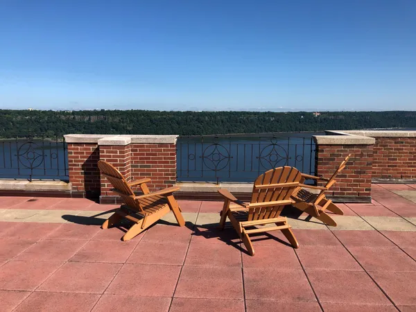 a view of a terrace with chairs